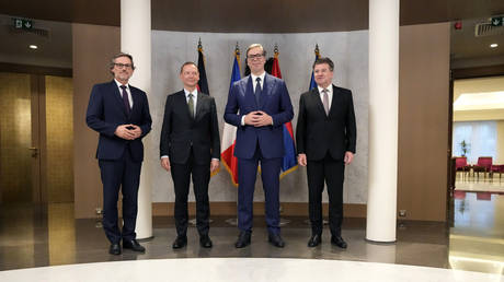 Right to left: EU envoy Miroslav Lajcak, Serbian President Aleksandar Vucic, Emanuel Bonne, and Jens Plettner, in Belgrade, September 9, 2022.