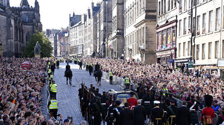 The Procession of Queen Elizabeth's coffin from the Palace of Holyrood house to St Giles Cathedral moves along the Royal Mile in Edinburgh, Scotland, September 12, 2022