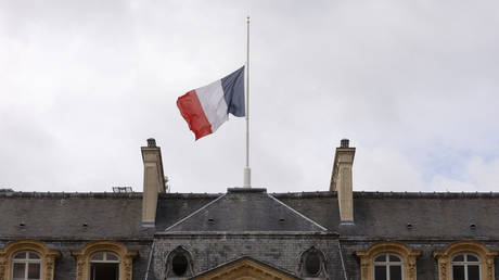 The French flag flies at half-mast atop the presidential Elysee Palace in Paris, France, September 9, 2022,