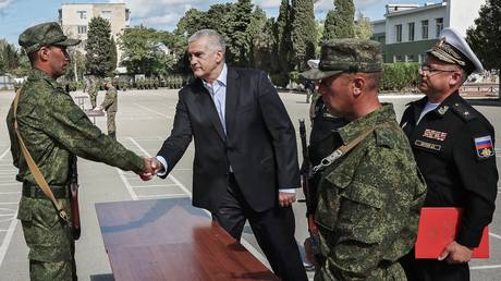 The head of the Republic of Crimea, Sergey Aksyonov (center), at the oath-taking ceremony for mobilized residents of the city of Sevastopol and the Republic of Crimea at the base of the 810th Separate Guards Order of Zhukov Marine Brigade in Sevastopol.