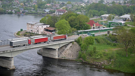 A view from the Estonia side shows the border crossing over the Narva River into Russia.