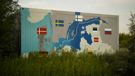 FILE PHOTO: A painting showing the Nord Stream pipelines is displayed on a container near the Nord Stream 1 Baltic Sea pipeline in Lubmin, Germany, July 20, 2022