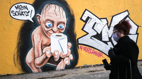 FILE PHOTO: A graffiti in Berlin, Germany, March 21, 2020