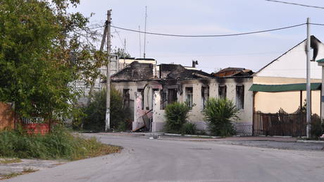 FILE PHOTO: A destroyed building on a street in Krasny Liman.