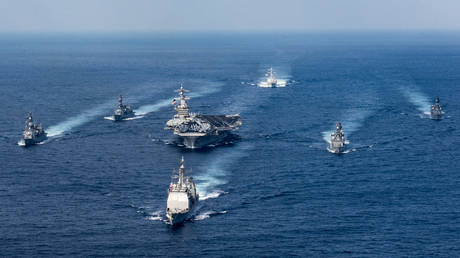 The USS Carl Vinson carrier strike group in the western Pacific.