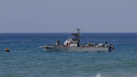 An Israeli Navy vessel is moored in Mediterranean waters off Israel's crossing at Rosh Hanikra, known in Lebanon as Ras al-Naqura, at the border between the two coutries, on October 4, 2022.