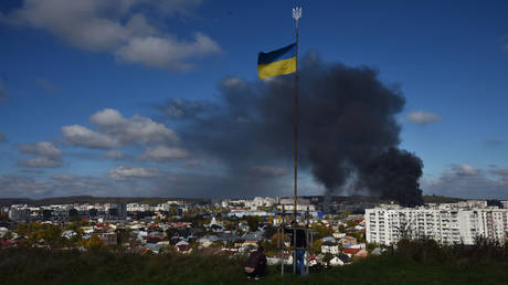 FILE PHOTO. A Ukrainian flag flies in Lvov after Russian attacks.