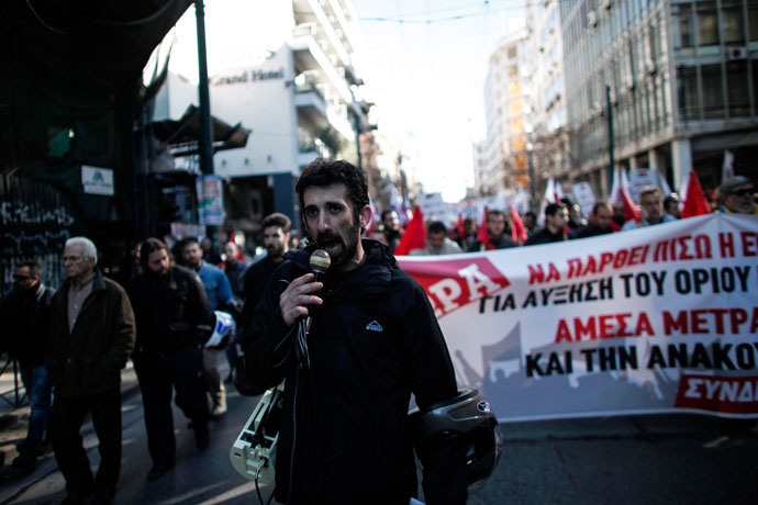 Members of a Greek Communist trade union demonstrate on February 20, 2013 in the center of Athens.(AFP Photo / Angelos Tzortzinis)