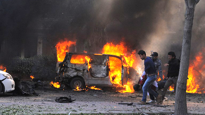 A powerful car bomb explosion near the headquarters of Syria's ruling Baath party in the centre of Damascus. (AFP Photo)