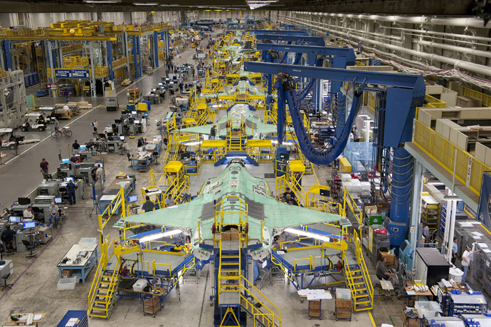 Workers can be seen on the moving line and forward fuselage assembly areas for the F-35 Joint Strike Fighter at Lockheed Martin Corp's factory located in Fort Worth, Texas in this October 13, 2011 handout photo provided by Lockheed Martin. (Reuters/Lockheed Martin/Randy A. Crites)