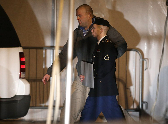 Bradley E. Manning is escorted from a hearing, on February 28, 2013 in Fort Meade, Maryland. (AFP Photo / Mark Wilson)