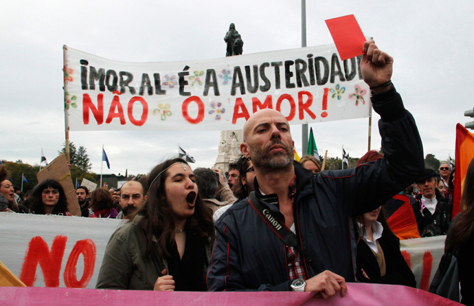 Demostrators shout while taking part in a march against government austerity policies in Lisbon March 2, 2013 (Reuters / Hugo Correia) 