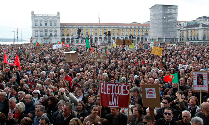 People gather to protest against government austerity policies at Lisbon's main square Praca do Comercio March 2, 2013 (Reuters / Hugo Correia) 