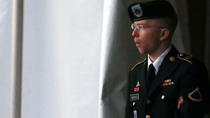 Pfc. Bradley E. Manning is escorted from a hearing, on January 8, 2013 in Fort Meade, Maryland. (AFP Photo / Mark Wilson)