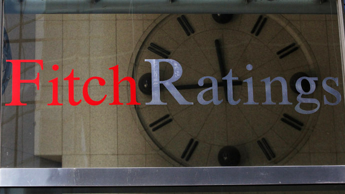 Fitch downgrades Italy, outlook negative