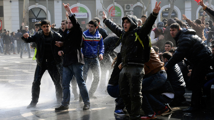 Protesters shout during a rally against the death of soldiers in the national Azerbaijan's army in Baku on March 10, 2013 (AFP Photo / Tofik Babayev)