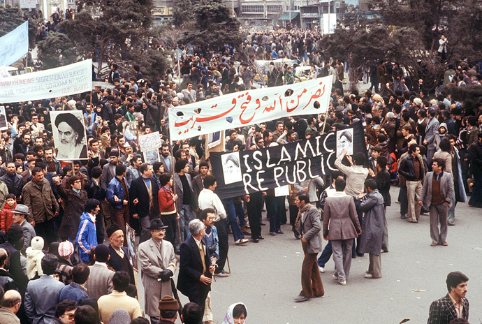 A February 1979 rally in Tehran in support of the National Front government formed on February 14 by Ayatollah Khomeini. The banner with Khomeini's portrait calls for the creation of the Islamic Republic, which will be formed on April 1 of that year. (AFP photo)