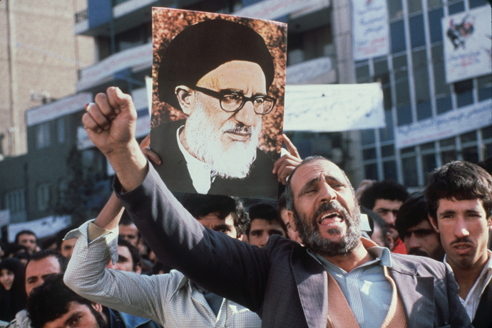 An Anti-American crowd demonstrates outside of the US Embassy, 21 November 1979 (AFP Photo)