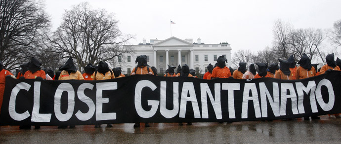 Amnesty International members protest in front of the White House in Washington January 11, 2012. (Reuters)