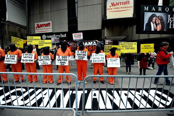 Activists demand the closing of the US military's detention facility in Guantanamo during a protest, part of the Nationwide for Guantanamo Day of Action, April 11, 2013 in New York's Times Square (AFP Photo / Stan Honda)