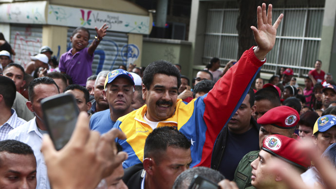 Venezuela's acting President Nicolas Maduro (C) greets supporters during a gathering in Caracas March 16, 2013 in this picture provided by the Miraflores Palace. (Reuters/Miraflores Palace)