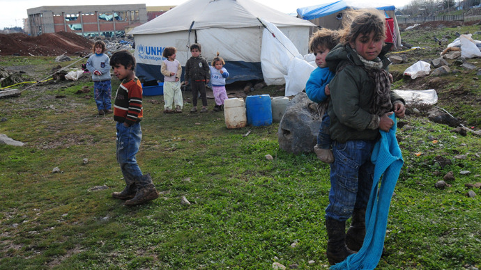 Turkish police fire teargas at Syrian refugees in camp protest
