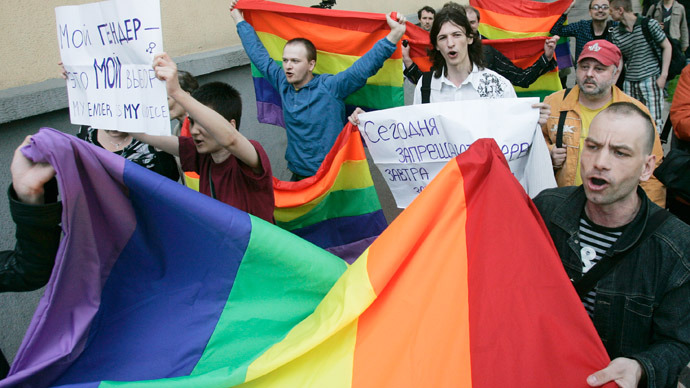 Putin orders ban on adoptions by foreign same-sex couples – report