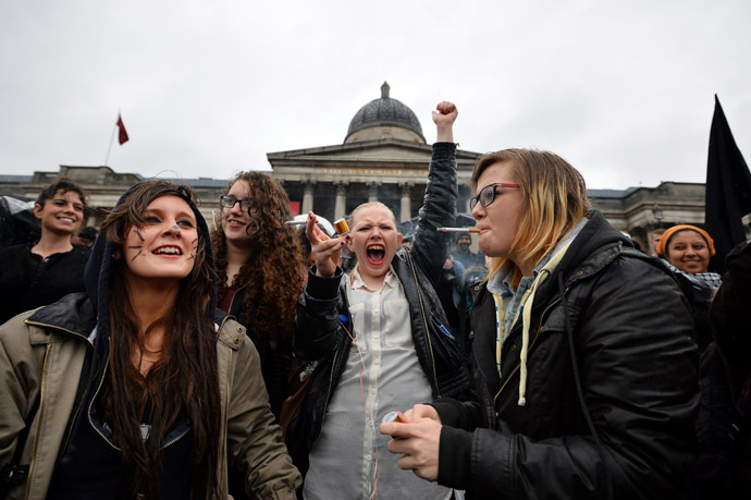 A woman cheers during a an anti-Thatcher party in Trafalgar Square in central London on April 13, 2013. (AFP Photo)