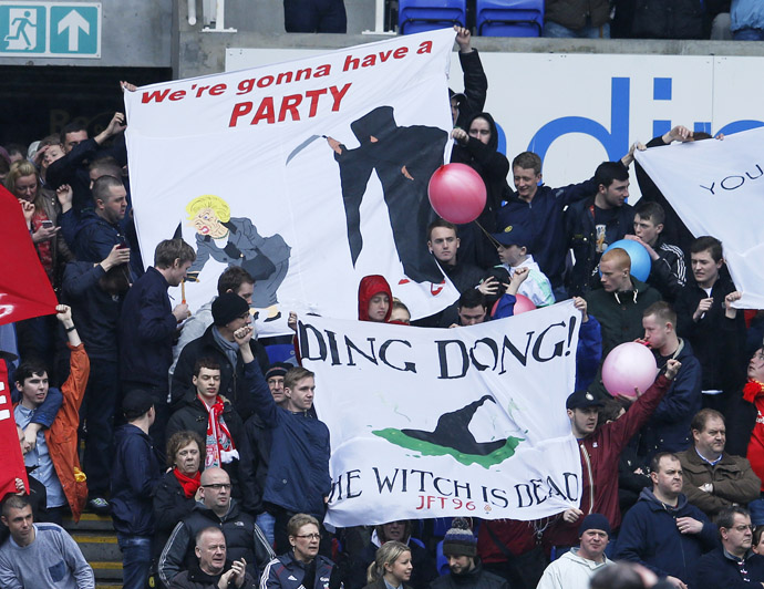 Liverpool fans hold up a banner commenting on the death of former British Prime Minister Margaret Thatcher, before their English Premier League soccer match against Reading at the Madejski Stadium in Reading, April 13, 2013. (Reuters)