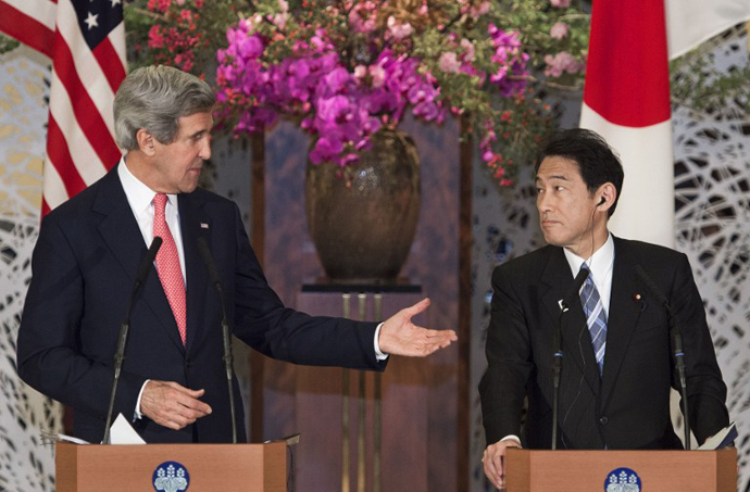 US Secretary of State John Kerry (L) gestures towards Japanese Foreign Minister Fumio Kishida at a joint press conference at Iikura House in Tokyo on April 14, 2013. (AFP Photo / Paul J. Richards)