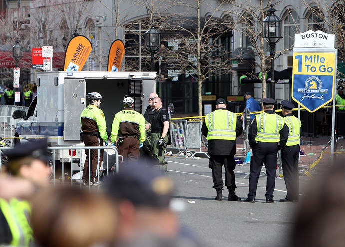 Police guard an area at the one mile checkpoint near Kenmore Square after two bombs exploded during the 117th Boston Marathon on April 15, 2013 in Boston, Massachusetts (Alex Trautwig / Getty Images / AFP) 