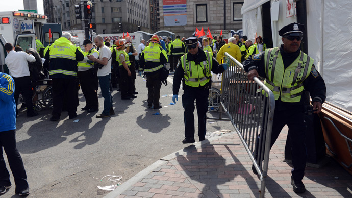 Emergency personnel take postion at the finish line after two bombs exploded during the 117th Boston Marathon in Boston, Massachusetts (AFP Photo / Darren McCollester)