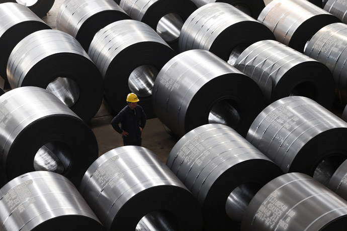 An employee works at a steel factory that exports to Europe and America in Jiaxing, Zhejiang province, February 28, 2013. (Reuters)