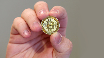 Americans fed up with currency manipulations, turn to Bitcoin
