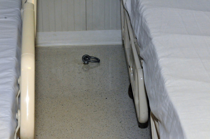Shackles restraint point between hospital beds inside the Joint Medical Group where the detainees receive medical care, Naval Station Guantanamo Bay, Cuba, April 10, 2013. (Image from publicintelligence.net / photo By Army Sgt. Brian Godette)