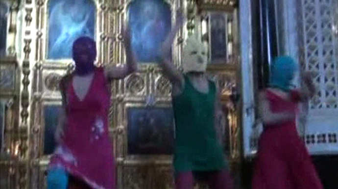 Still image taken from file video shows members of the female punk band "Pussy Riot" staging a protest inside Christ The Saviour Cathedral in Moscow. (Reuters)