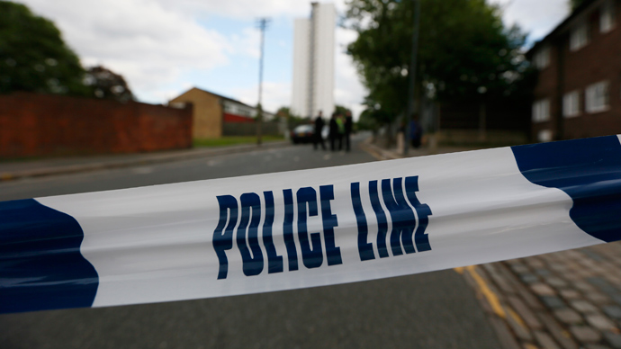 Police tape marks a cordon set up around a crime scene where one man was killed in Woolwich, southeast London May 22, 2013 (Reuters / Stefan Wermuth)