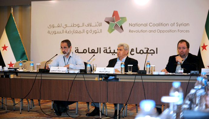 Members of the National Coalition of Syrian revolution and opposition forces, attend a meeting on May 23, 2013, in Istanbul. (AFP Photo / Bulent Kilic)