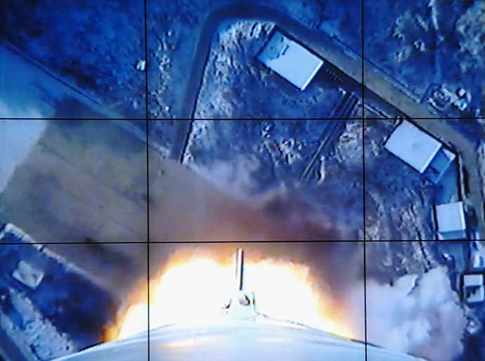 A screen shows a rocket being launched from an onboard camera at the West Sea Satellite Launch Site, at North Korea's satellite control centre in Cholsan county, North Pyongan province, in this photo released by Kyodo December 12, 2012. (Reuters / KCNA)