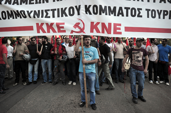 Greek communist party members and supporters march towards the Turkish embassy in Athens on June 3, 2013 during a solidarity march for Turkish protesters and the Turkish communist party (AFP Photo / Louisa Gouliamaki) 