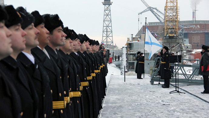 Russian naval officers attending the ceremony of St.Andrew's flag-hoisting at the Yury Dolgoruky nuclear-powered submarine in Severodvinsk.(RIA Novosti / Alexander Petrov)