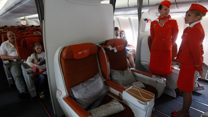 People sit onboard an Aeroflot Airbus A330 heading to the Cuban capital Havana at Moscow's Sheremetyevo airport June 27, 2013.(Reuters / Maxim Shemetov)