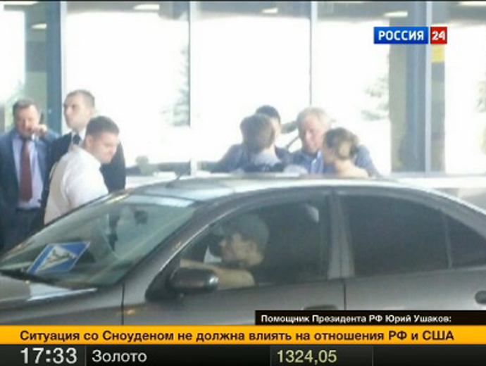 Photo of Edward Snowden leaving Sheremetyevo Airport (Video still from http://www.vesti.ru)