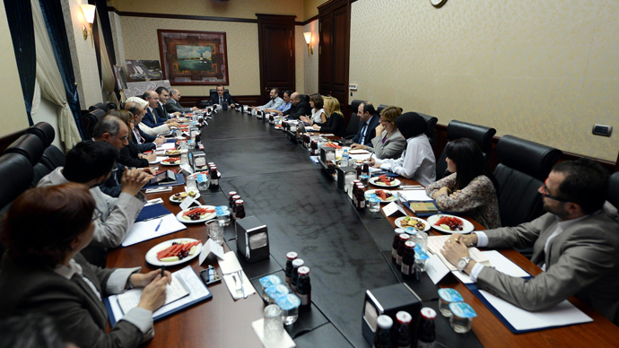 This handout picture released by the Turkish Prime Minister's Office shows the Turkish Prime Minister Recep Tayyip Erdogan (Back L) speaking during a meeting with the Taksim Solidarity Platform, which includes respresentatives of Gezi park protesters, on June 12, 2013, during a meeting in Ankara (AFP Photo)