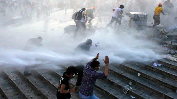 Tear gas and bulldozers: Istanbul riot police clear Gezi Park protest camp