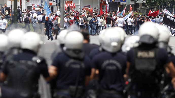 Protesters are confronted by police during a demonstration at Kizilay square in central Ankara June 16, 2013. (Reuters)