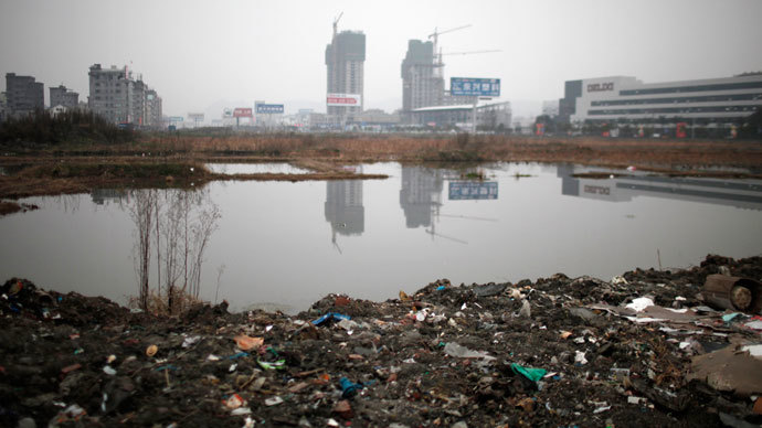 Polluted waters are seen at an industrial area of Wenzhou, in Zhejiang.(Reuters / Carlos Barria)