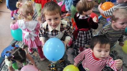 Russia bans adoptions by foreign same-sex couples