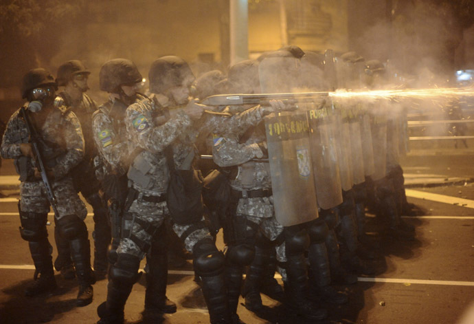 Riot police clash with demonstrators during a protest on the streets of Rio de Janeiro June 30, 2013. (Reuters)