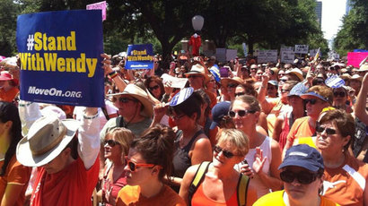Texas governor Perry signs restrictive abortion bill into law